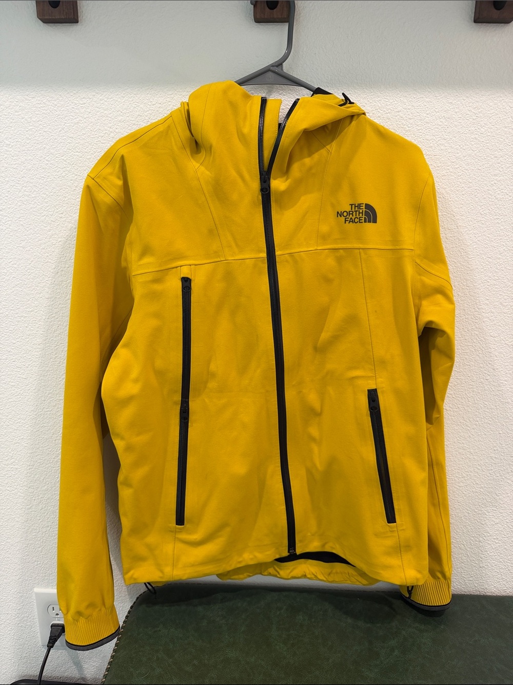 The North Face Yellow Hooded Raincoat with Black Zippers